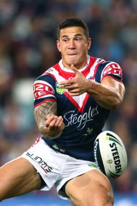 Sonny Bill Williams of the Roosters fumbles a pass.