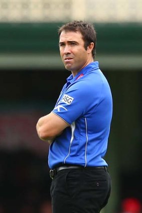 Brad Scott looks on during the game at the SCG.