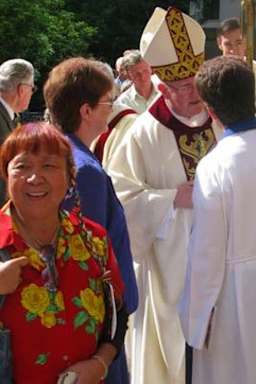 Archbishop Coleridge meets members of his flock after a three hour service at St Stephen's Cathedral