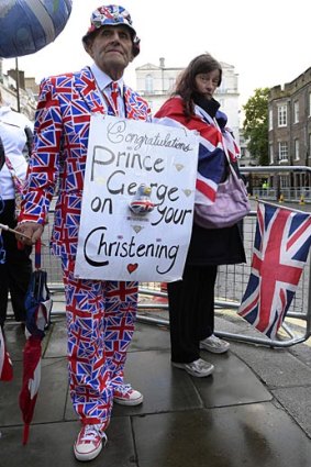 Royal fans wait outside St James's Palace before the christening of Prince George.
