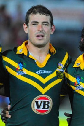 Terry Campese lines up alongside Johnathan Thurston for Australia against Papua New Guinea in the 2008 World Cup. The two will clash at Canberra Stadium tonight in what could be a preview of the No.6 battle for State of Origin I.