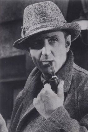 Basil Rathbone as the iconic Sherlock Holmes.