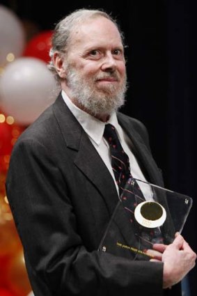 Dennis Ritchie, creator of the C programming language, receives the 2011 Japan Prize at Bell Labs headquarters.
