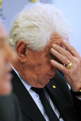 Frank Lowy announces Gold Coast United's expulsion yesterday.