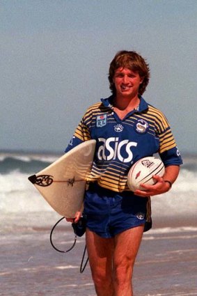 Surfy kid made good ... Parramatta winger Luke Burt takes a stroll on the beach in the lead-up to his NRL debut in 1999.