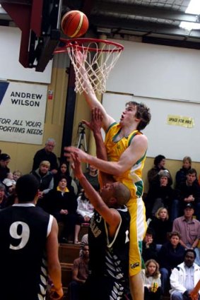 Ben Dowdell fires to the basket in August 2006.