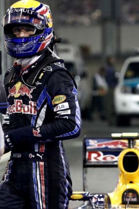 Mark Webber in the parc ferme of the Yas Marina circuit after the qualifying session of the Abu Dhabi Formula One Grand Prix.