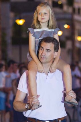 Daddy's girl: Spanish Prince Felipe walks with his daughter Leonor.
