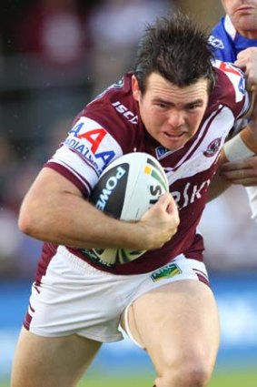 Knightmare: Manly skipper Jamie Lyon bursts up field in a rampant display against the Knights on Sunday.