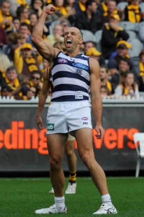 Geelong's James Podsiadly celebrates a goal against Hawthorn on Easter Monday.