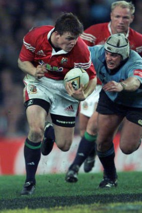 Young Lion: O'Driscoll outstrips an equally youthful Phil Waugh during his first Lions tour, in 2001.