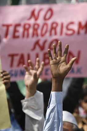 Out of reach ... supporters of the Sunni Tehreek Party attend an anti-Taliban rally.