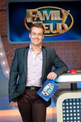 Grant Denyer as host of <i>Family Feud</i>.