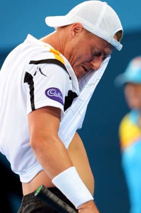 Bundled out ... Lleyton Hewitt during his loss to Denis Istomin.