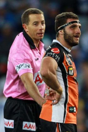 Hard done by ... Tigers captain Robbie Farah talks with referee Ben Cummins.