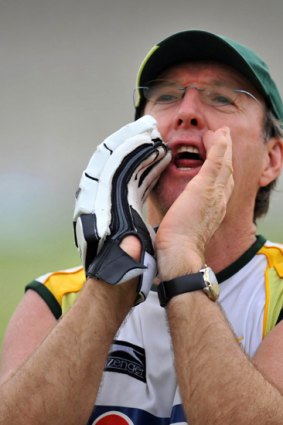 Then Pakistan cricket coach Geoff Lawson calls cricketer Yonus Khan during a practice session in 2008.