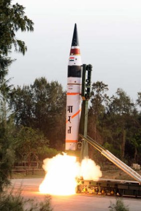 A long-range missile, capable of carrying a one-tonne nuclear warhead is tested in India in 2012.