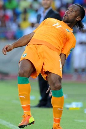 Bending over backwards ... Ivory Coast's Didier Drogba.