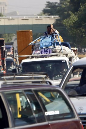 Road rules: Gridlock in the streets of Baghdad.