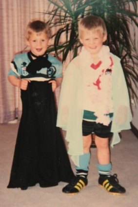 Split allegiances: Josh and Brett Morris in Sharks and Dragons gear as young boys.