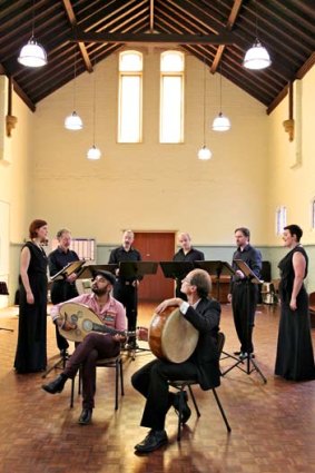 Golden glow: Roland Peelman and Joseph Tawadros, front, with the Song Company singers.