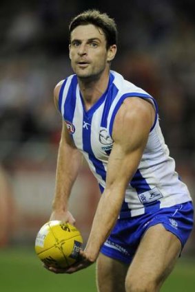 North Melbourne's Brady Rawlings in action in 2011.