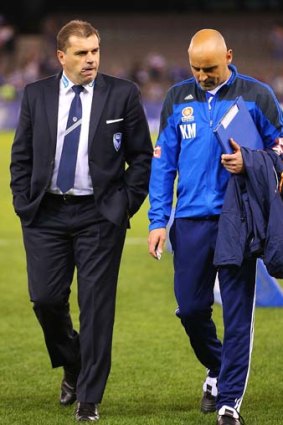 Victory coach Ange Postecoglou and his assisant Kevin Muscat after the match against Melbourne Heart.