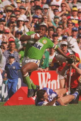 Noa Nadruku in his heyday at the Raiders as he makes a break in the club's 1994 grand final win against the Bulldogs.