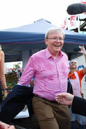 Covered in sweat and smiles: Kevin Rudd.