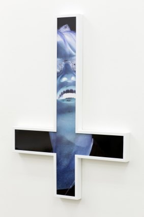 Tony Garifalakis, <i>Inverted Crucifix #1</i>, 2014. type-c print face mounted to Perspex, oak frame, 82 x 59 x 4cm, 
edition 1 of 6. Courtesy the artist and
Sarah Scout Presents, Melbourne, and Hugo Michell Gallery, Adelaide.

