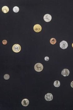 <i>Galaxy</i>, painted coins, by Ni Youyu, of China.  