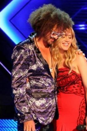 Redfoo with outgoing contestant Reigan Derry.