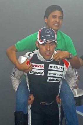 Moments later ... Maldonado carries his 12-year-old cousin Manuel out of the Williams garage.