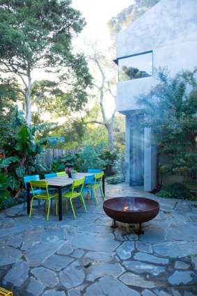 A paved dining area in Fiona Brockhoff's Toorak garden.