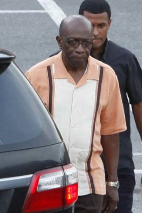 Former FIFA vice president Jack Warner resigned as Trinidad and Tobago's national security minister on Sunday.