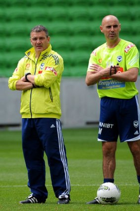 Tough times: Mehmet Durakovic and Kevin Muscat at Melbourne Victory training on Friday.