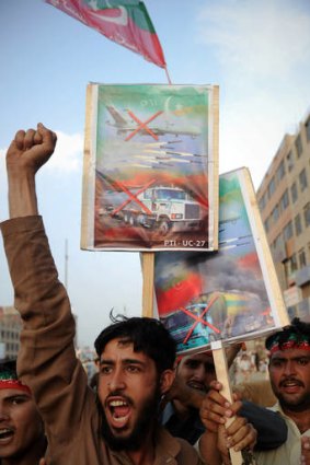 Pakistani activists protest against the reopening of the NATO supply route to Afghanistan, Peshawar, July 14.