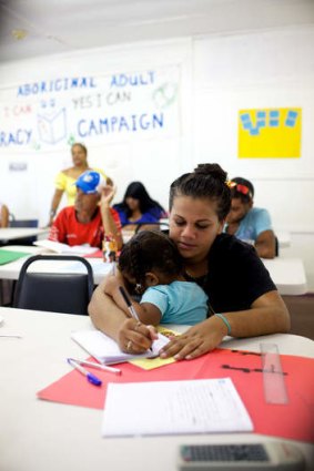 Watch and learn: Student Chelsea Dennis with her daughter Dannilee.