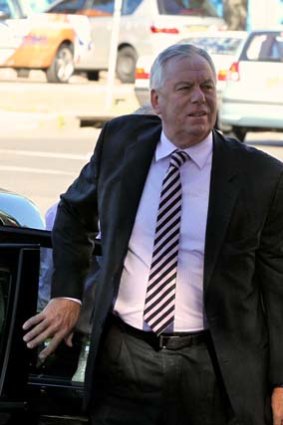 $50,000 bail ... Mr Williamson arrives at Maroubra police station yesterday morning.