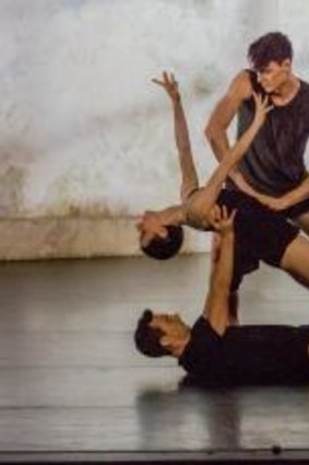 Todd Sutherland, Jesse Scales, and Sam Young-Wright (standing) perform in the Sydney Dance Company's Frame of Mind. 