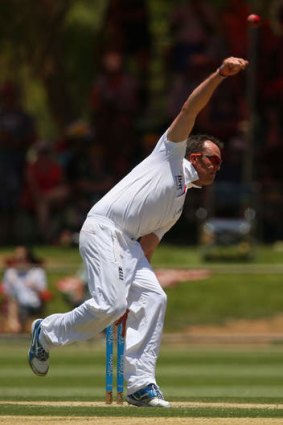 Graeme Swann bowls during day two at Traeger Park Oval.
