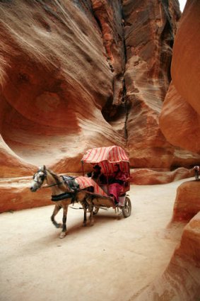 Horse sense … a carriage ride through the gorge known as the Siq is a popular way of reaching Petra..