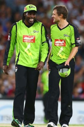 Losing and laughing: Chris Gayle and Dirk Nannes can smile even though Sydney Thunder has not won a match this season.