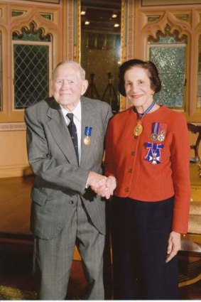 Dick Nossiter accepting his OAM from NSW Governor Marie Bashir in 2010.