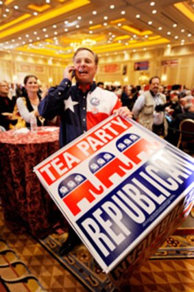 A Tea Party supporter celebrates a Republican victory in Las Vegas.