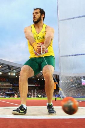 Canberra's Tim Driesen competing in the Commonwealth Games final of the hammer.