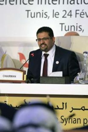 Tunisia's Foreign Affairs Minister Rafik Abdessalem speaks at  the 'Friends of Syria' conference.