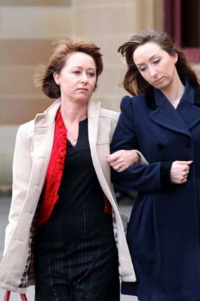 Grieving: Widow Fiona Rixon and her daughter.