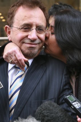 Theo Theophanous outside court with his wife, Rita.