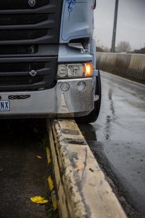 A milk truck stuck on a divider on the Monaro Highway on Wednesday.